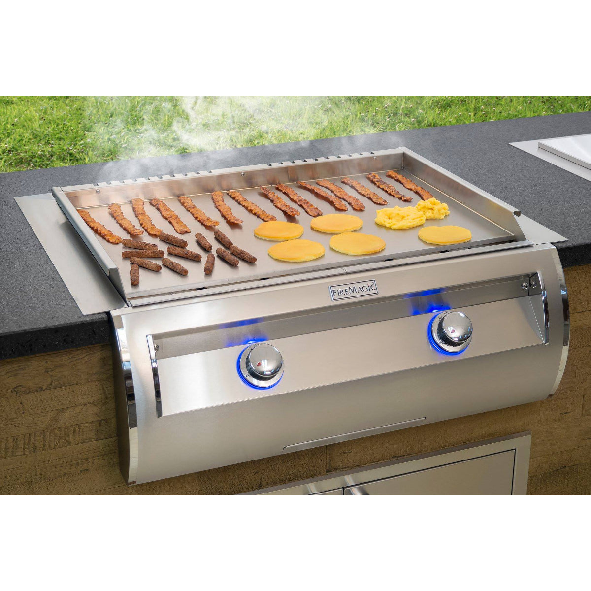 https://upperlivin.com/cdn/shop/products/fire_magic_e660i-Builtin_griddle_display.jpg?v=1674524907